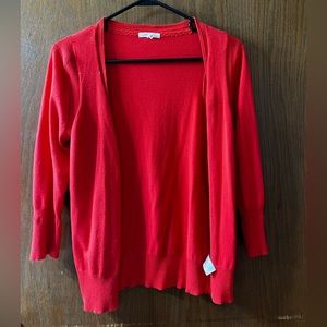 Maurice’s 3/4 sleeve salmon colored sweater. Size medium. Worn once.